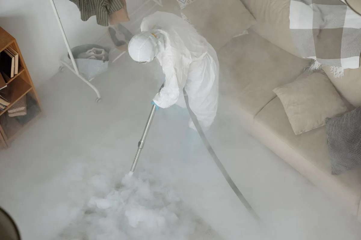 Biohazard cleanup technician in protective equipment, Virginia Park, Tampa, FL